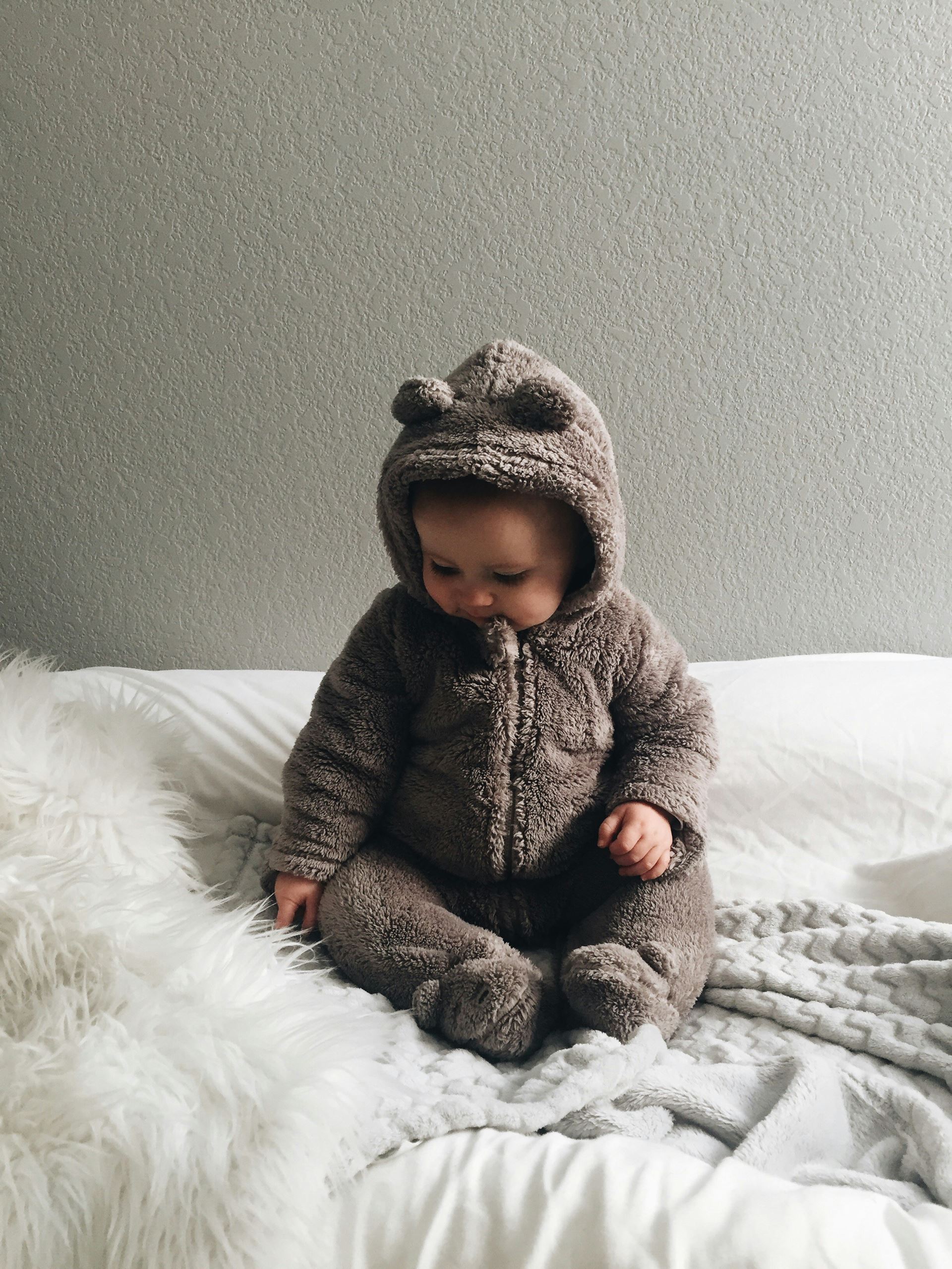 baby in bear suit